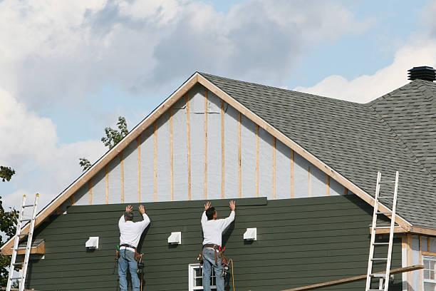 Professional Vinyl Siding technician working in Entriken, PA